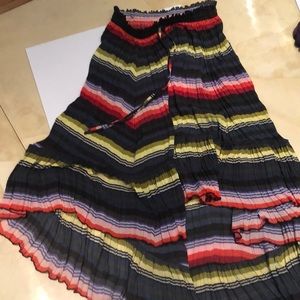 Asymmetrical pleated skirt with elastic tie waist